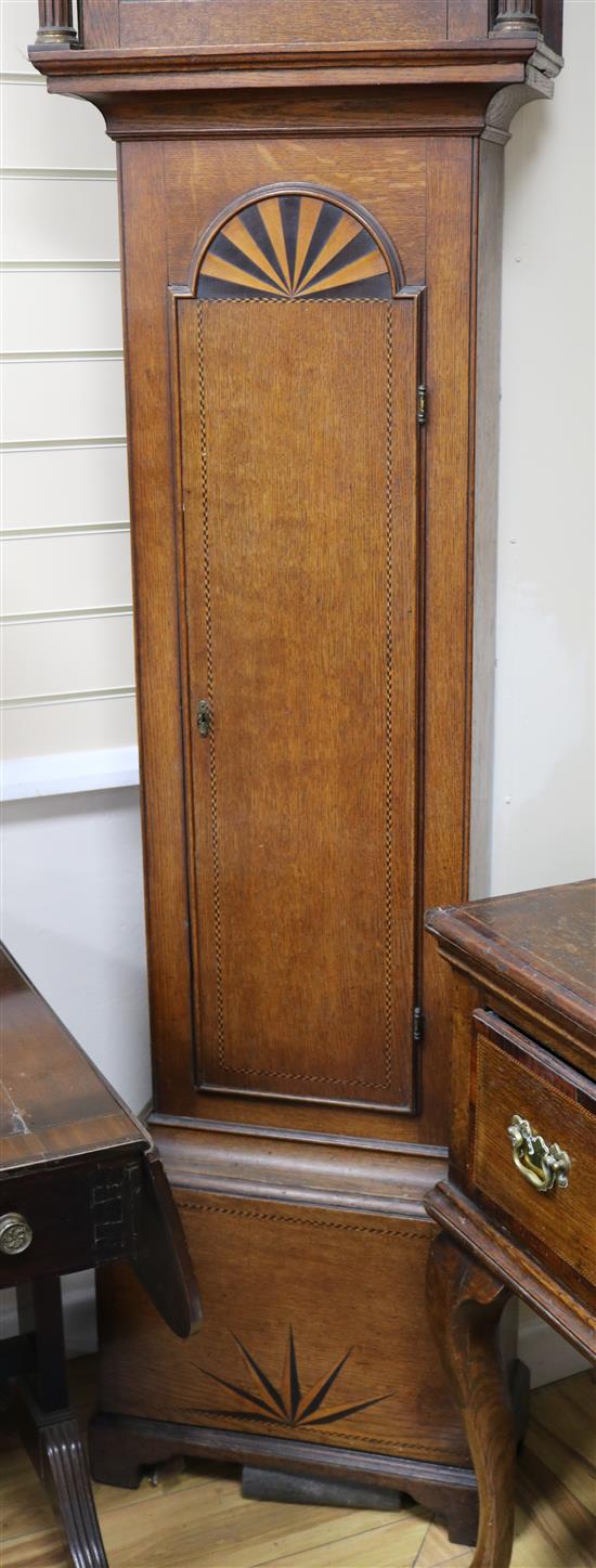 A George III inlaid oak longcase clock, by Jon Nevill of Norwich, H.240cm